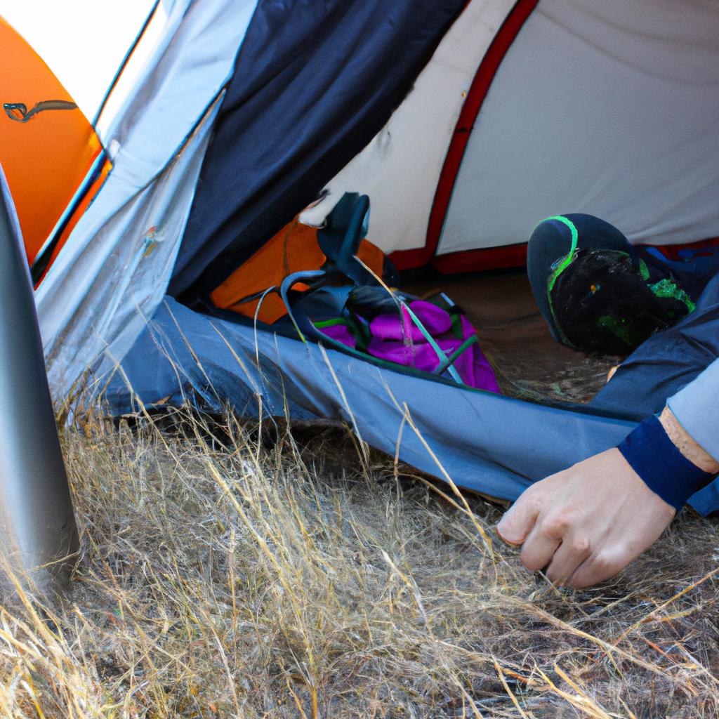 Person using camping gear outdoors