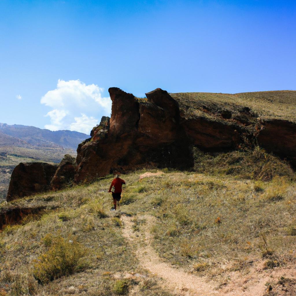 Person hiking in mountainous terrain